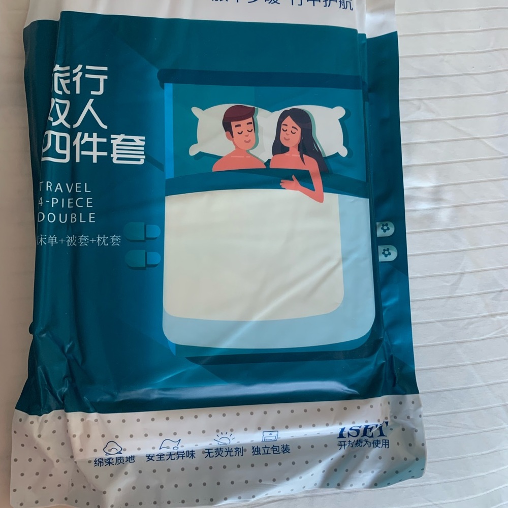 4 Piece disposable travel bedding in original package